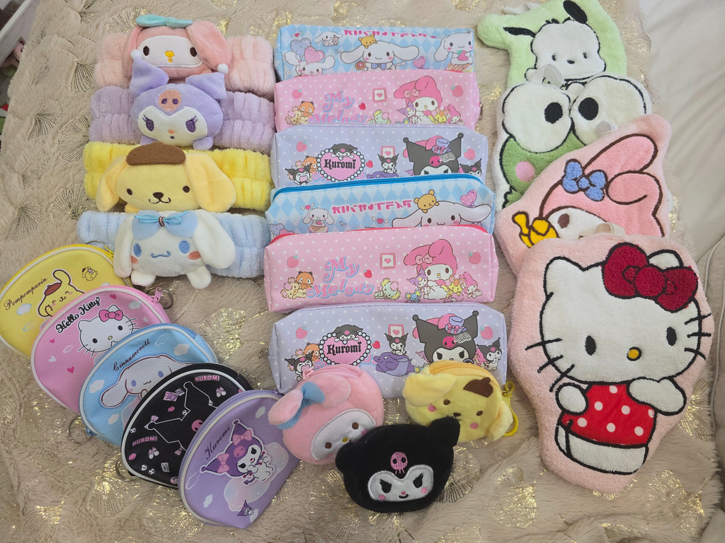 Collection of colorful cartoon-themed pouches on a textured surface